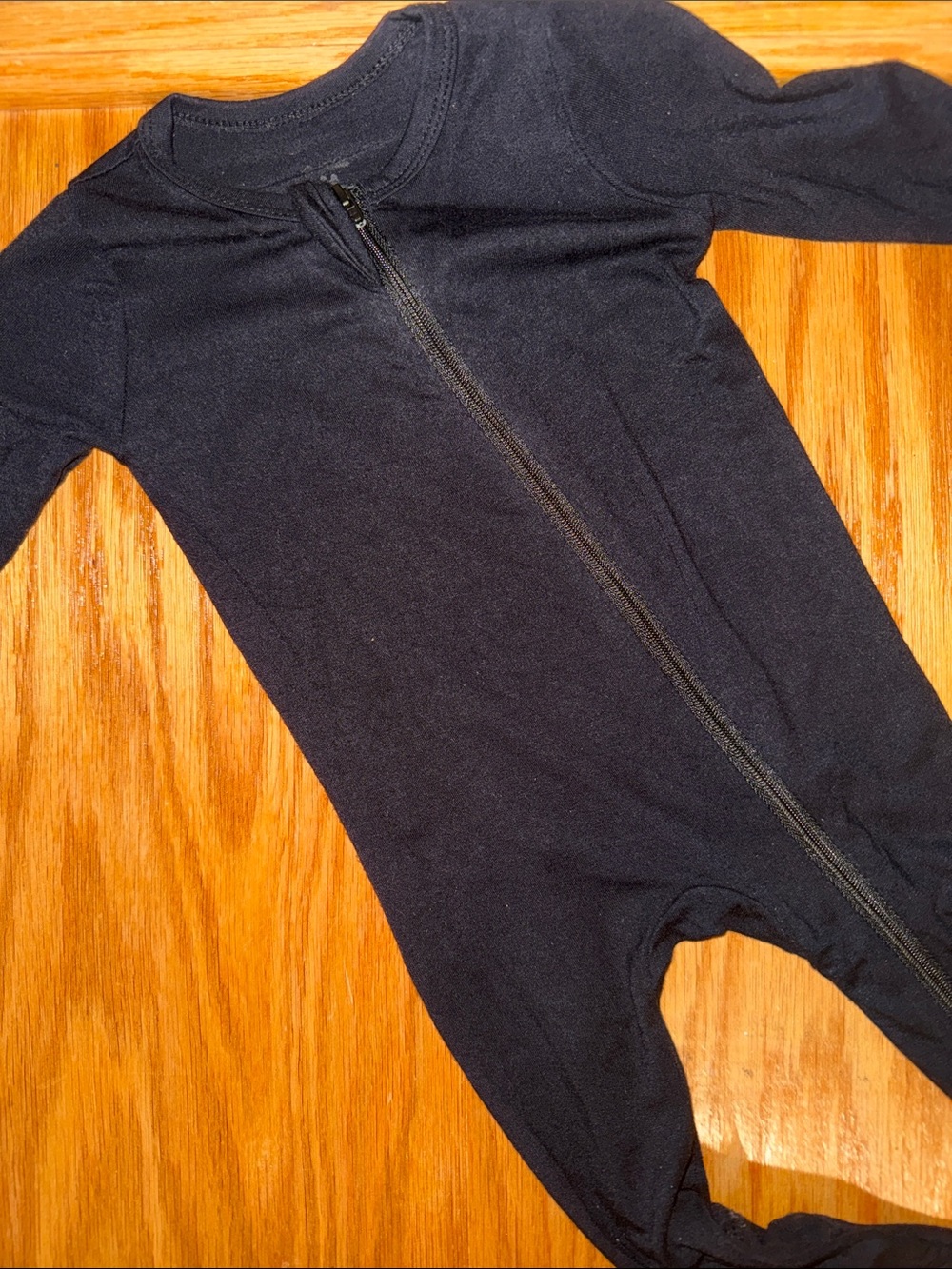 Kyte BABY black bamboo onsie